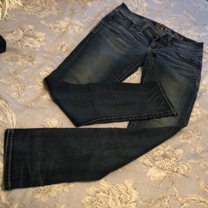 BUCKLE SKINNY JEANS